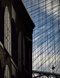 Low angle view of modern building against sky