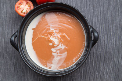 High angle view of ice cream in bowl on table