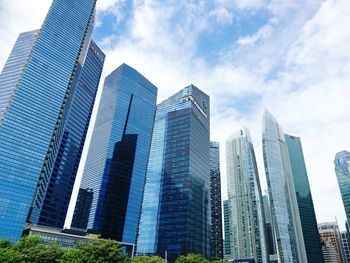 Low angle view of skyscrapers against sky