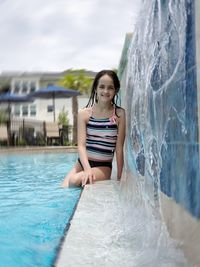 Young woman in swimming pool