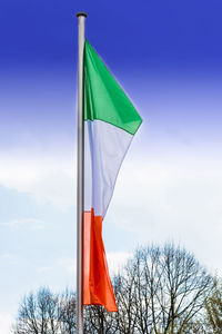 Low angle view of flag against sky