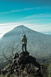 Staring at the mountain scenery. mount sindoro, central java