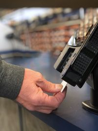 Close-up of man working on table