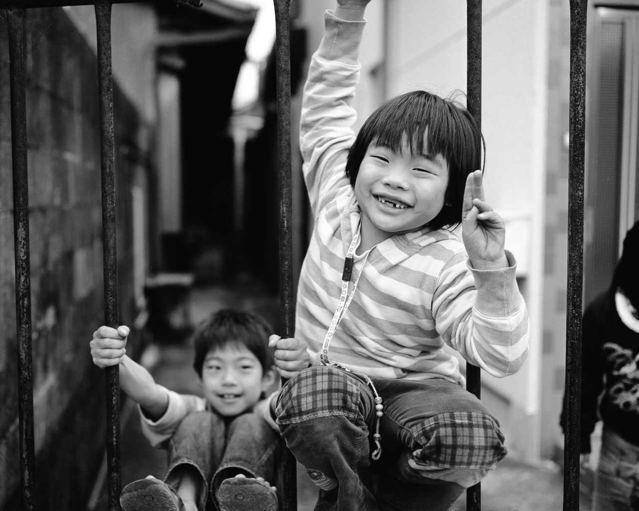 child, boys, childhood, males, two people, playground, smiling, people, outdoors, real people, portrait, cheerful, togetherness, day, adult