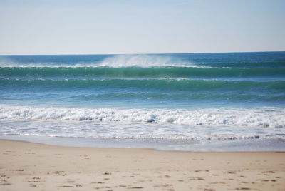 Scenic view of beach against sky