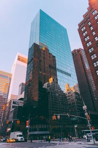 Low angle view of skyscrapers against sky