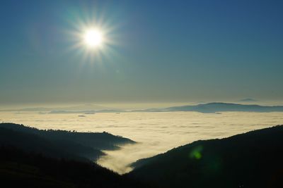 Sun shining through clouds