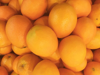 Full frame shot of oranges at market stall