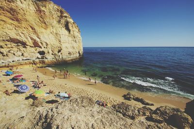 Scenic view of beach against clear sky