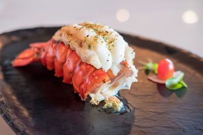 Close-up of sushi served on table