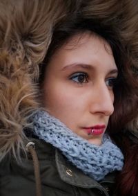 Close-up portrait of woman looking away