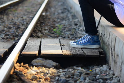 Low section of person on railroad track