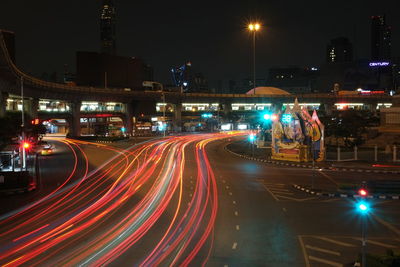 Light trails on city street at night