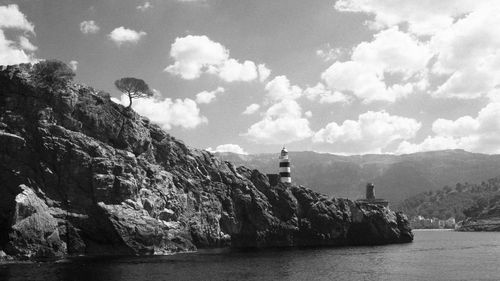 Scenic view of mountains and sea against sky