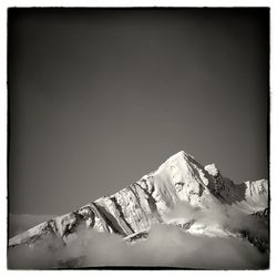 Scenic view of snow covered mountains