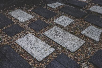 High angle view of stones on footpath