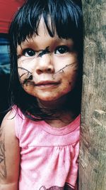 Close-up portrait of smiling girl