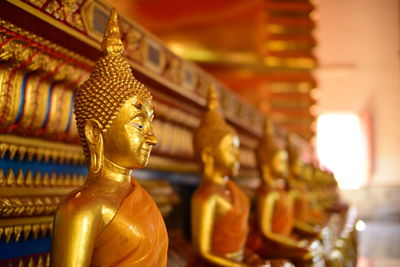 Buddha statue in temple outside building