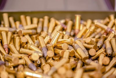 Close-up of bullets in container