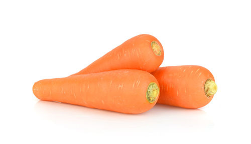 Close-up of orange against white background