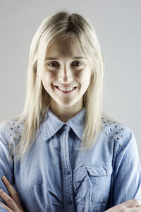 Portrait of smiling woman with blond hair