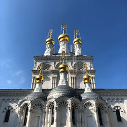 Low angle view of building against blue sky