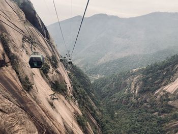 Overhead cable car over mountains