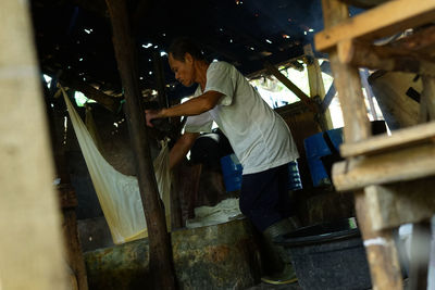 Side view of man working