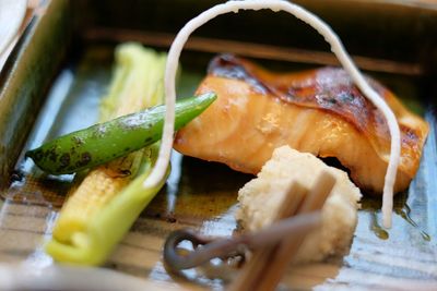 Close-up of roasted food on table