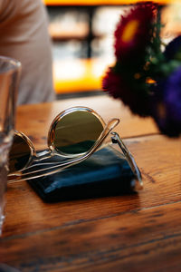 Close-up of sunglasses on table