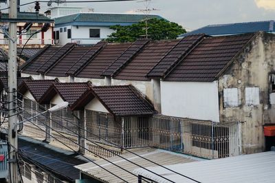 High angle view of roof and building against sky