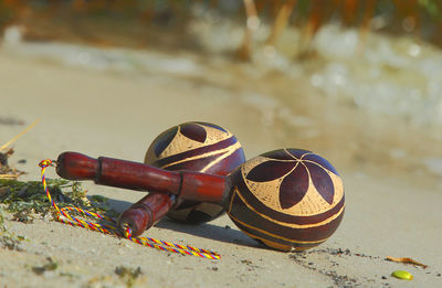 Close-up of rusty metal on beach