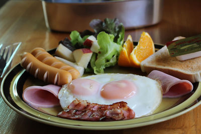 Close-up of breakfast served on table