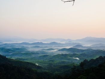 Scenic view of mountains against sky during sunset