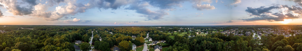 Scenic view of landscape against cloudy sky