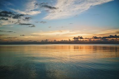 Scenic view of sea against sky at sunset