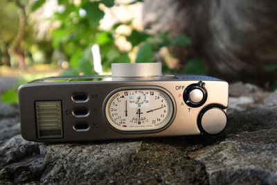 Close-up of camera on rock