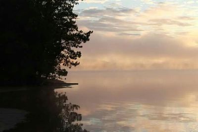 Scenic view of sea at sunset