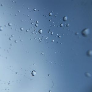 Full frame shot of water drops on window