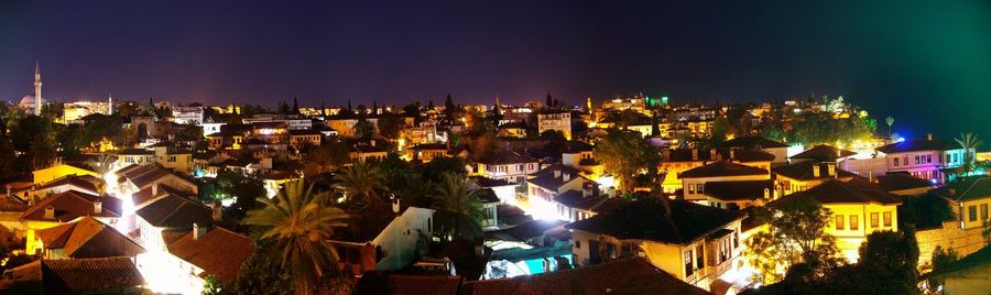 High angle view of illuminated buildings in town at night