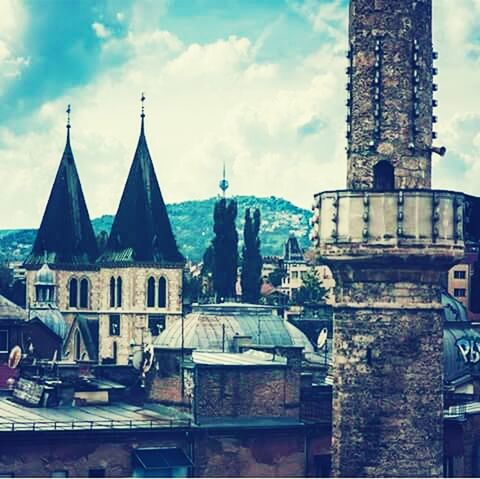 building exterior, architecture, built structure, place of worship, religion, church, spirituality, sky, cathedral, cloud - sky, cloud, city, steeple, dome, cloudy, clock tower, travel destinations, tower