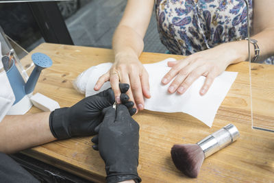 High angle view of man working on table