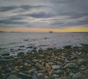 Scenic view of sea against sky during sunset
