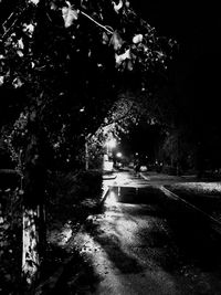 Close-up of car on road at night