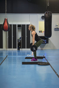 Woman weightlifting in gym