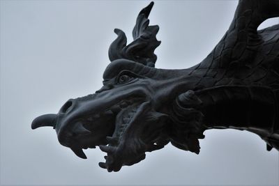 Low angle view of statue against clear sky