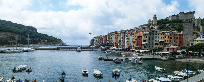 Panoramic view of townscape by sea against sky