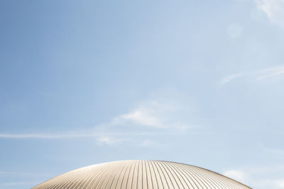 Low angle view of building against blue sky