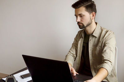 Young man using mobile phone