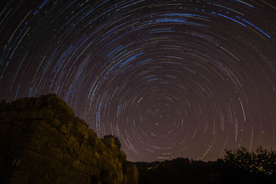 Low angle view of star field against sky at night